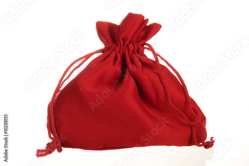 A full red bag isolated on white