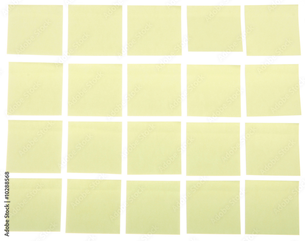 Fototapeta premium Yellow post it notes on a white background,