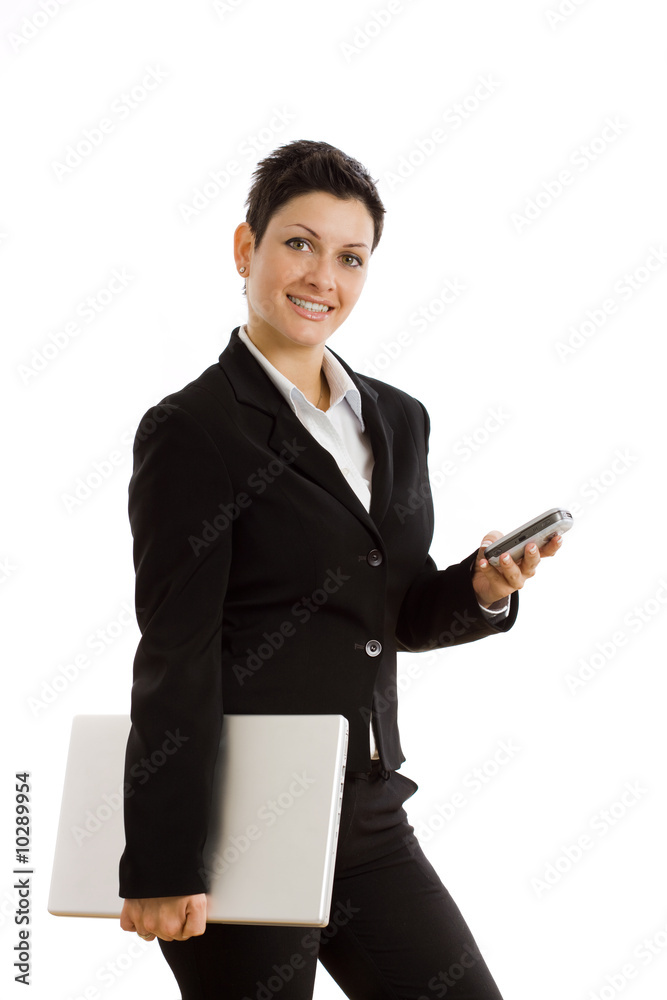 Happy businesswoman with mobile phone and laptop Happy businesswoman with mobile phone and laptop