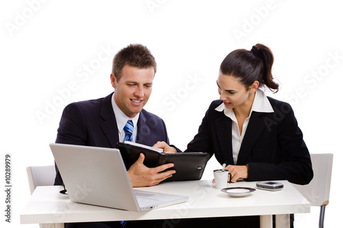 Business people working together at desk, white background.