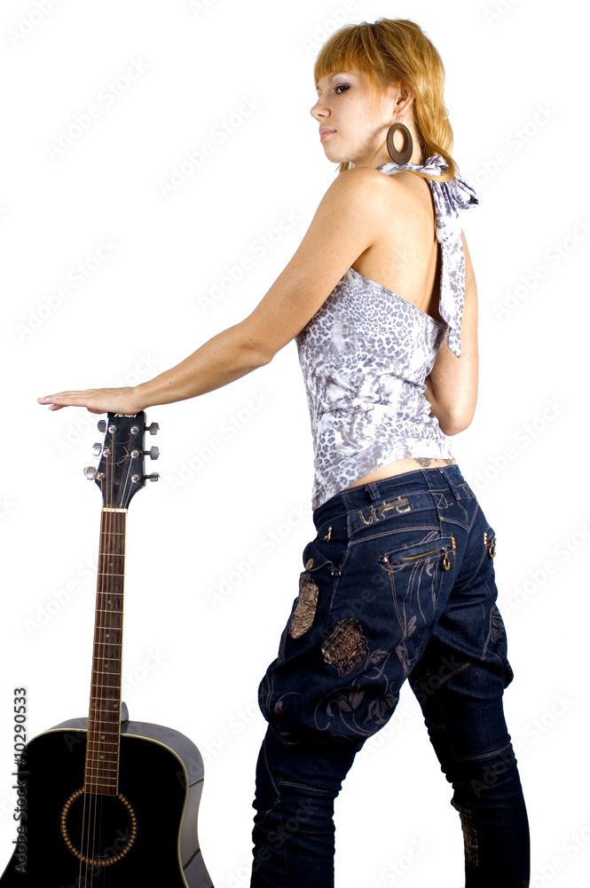 Pretty, blonde girl holding guitar
