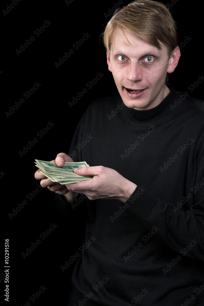 Emotional the man and money to a black background Emotional the man and money to a black background