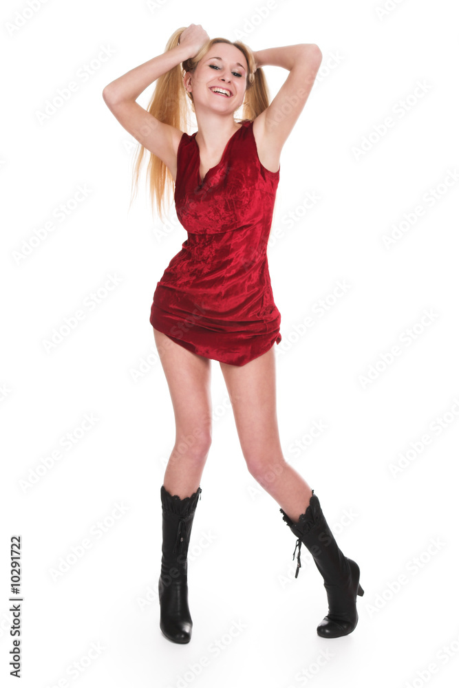 The beautiful girl in a red dress on a white background The beautiful girl in a red dress on a white background