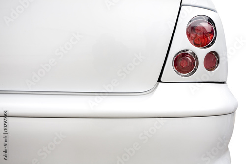 Rear red lights on plain white car. Styling and tuning concept