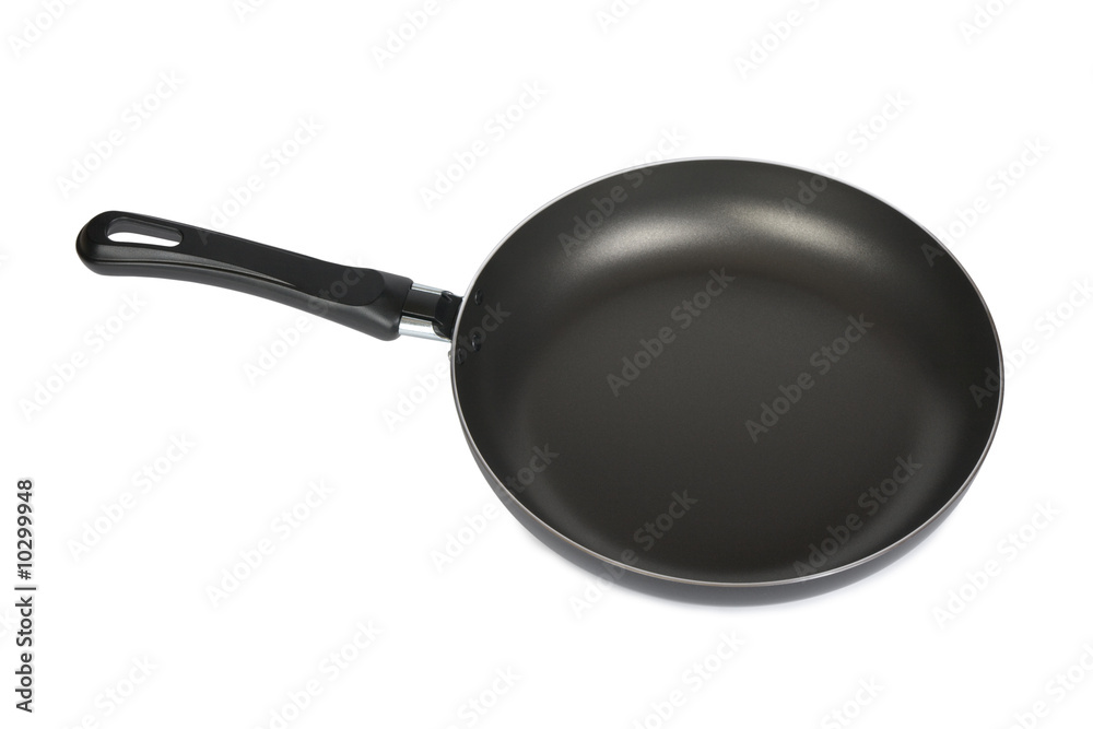 Black frying pan isolated on white background Black frying pan isolated on white background
