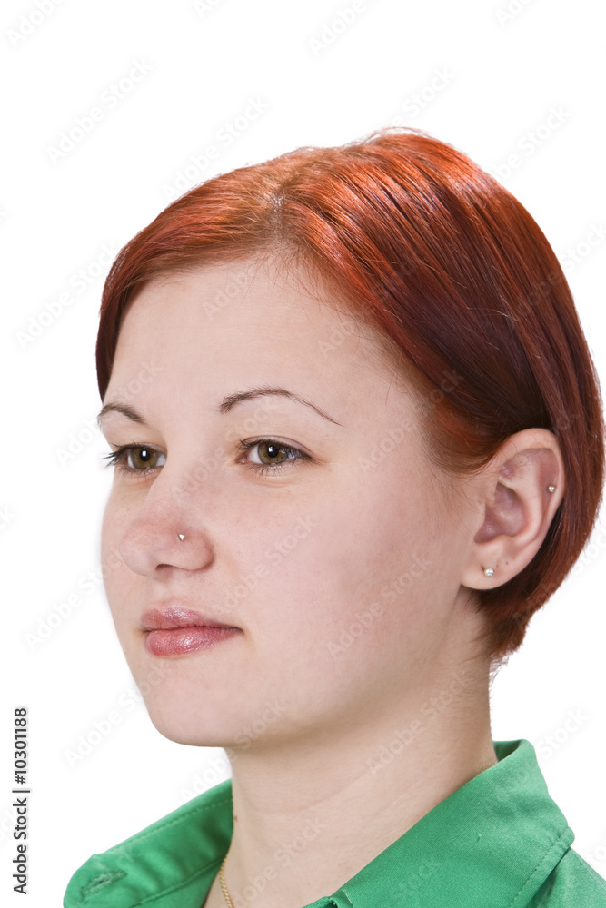 Portrait of a redheaded girl with pierced nose and ear Portrait of a redheaded girl with pierced nose and ear