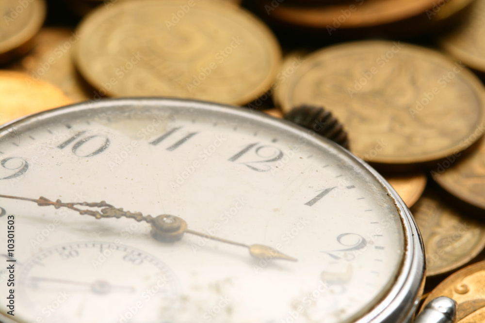 time is money coins and clock macro concet time is money coins and clock macro concet