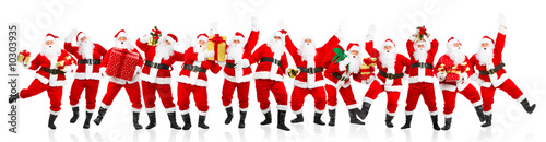 Happy dancing Christmas Santa. Isolated over white background. © grinny