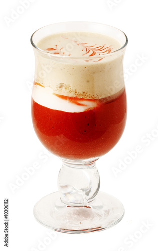 Coffee cocktail with cream and strawberries in glass