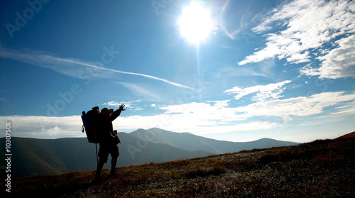 An image of silhouette of man on a hill