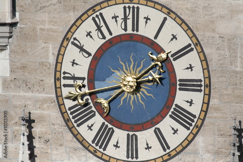 Gold clock with mosaic, town hall Marienplatz - Munich Germany