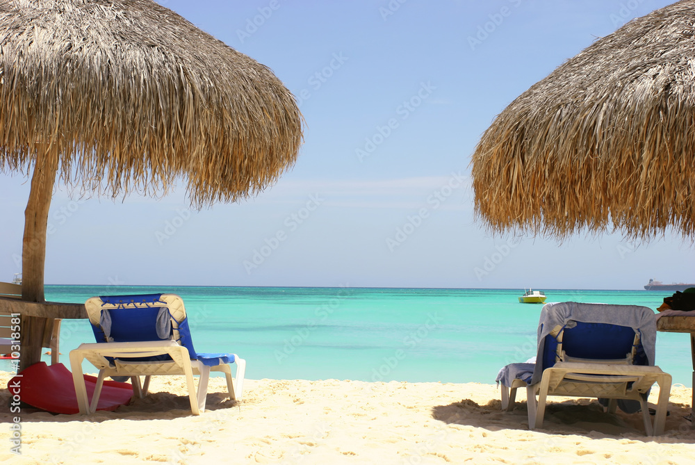 Lounge chairs on caribbean sea