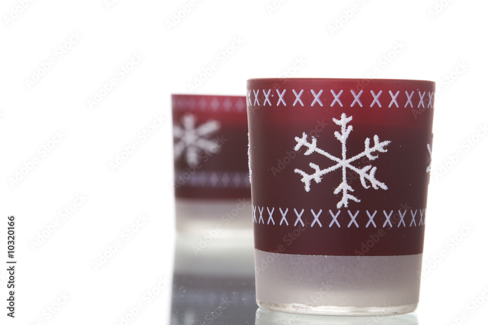 red christmas candles with reflection (selective focus) red christmas candles with reflection (selective focus)