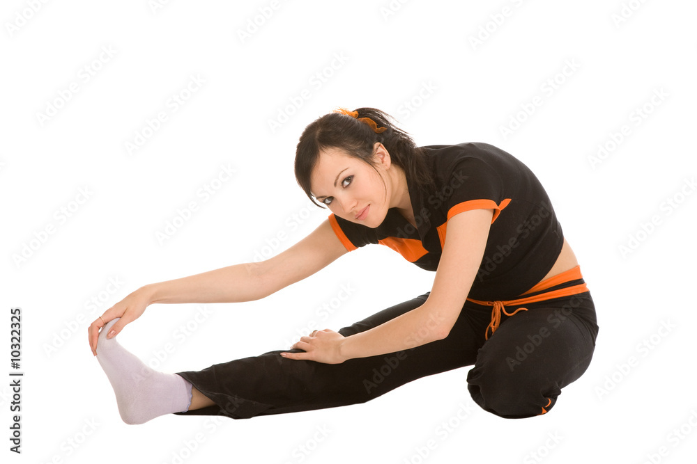 young woman makes exercises on a white background