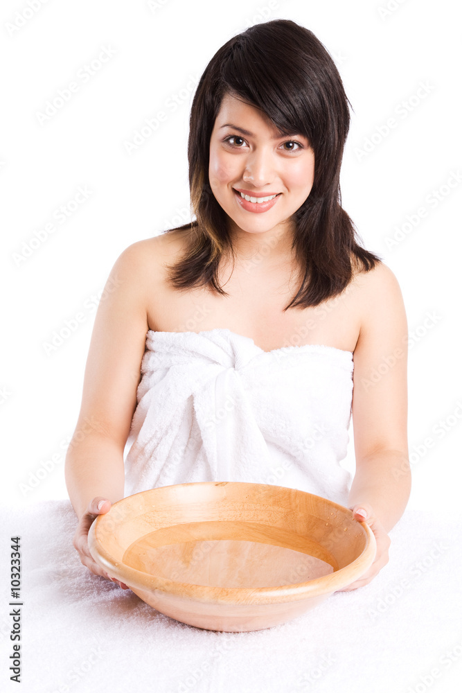 A beautiful asian girl getting ready to wash her face at a spa A beautiful asian girl getting ready to wash her face at a spa