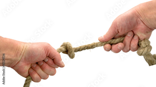 Hand keeps rope with node on white background