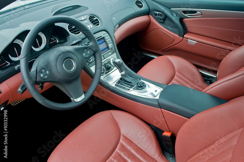 Interior of luxurious sport car © dundanim