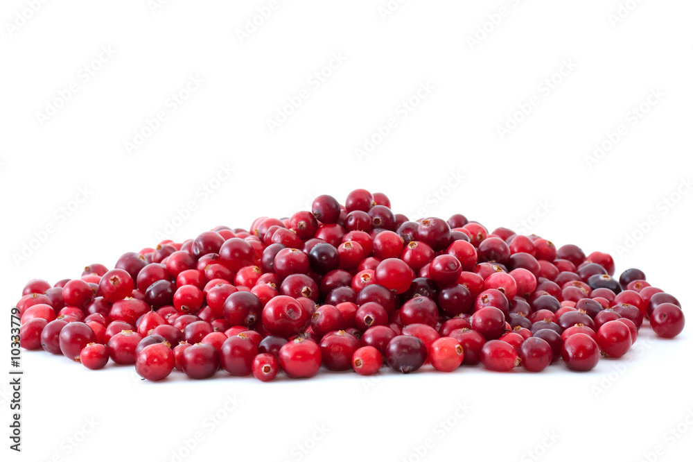Pile of ripe cranberries isolated on the white background Pile of ripe cranberries isolated on the white background