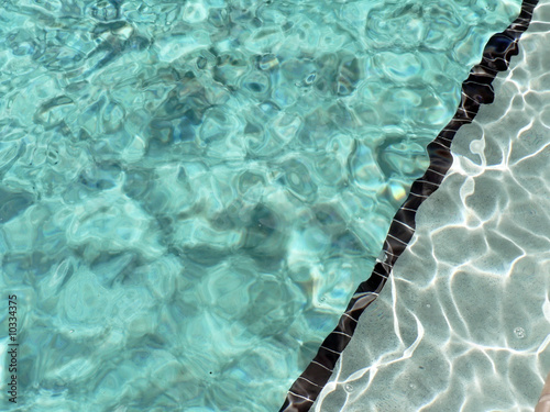 close up of water in a outdoor pool at a resort