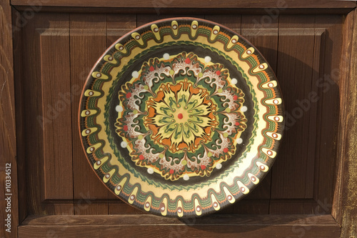 Old hand made painted dish