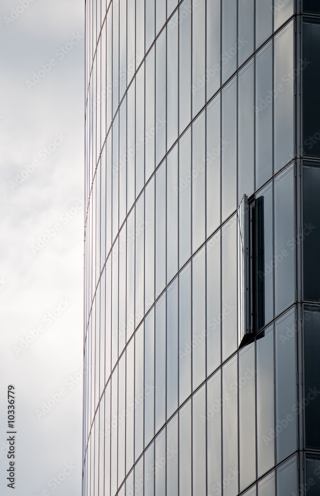 Modern skyscraper with one window opened