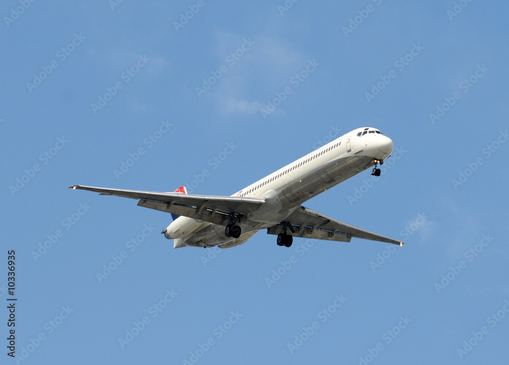 Passenger jet approaching airport for landing Passenger jet approaching airport for landing