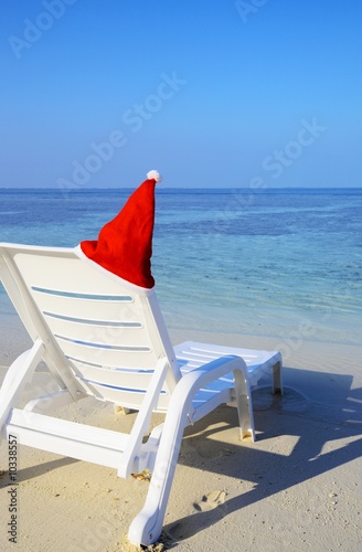 Armchair are waiting you on a white sandy beach