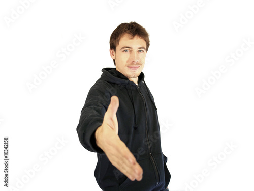 A young man indicating on white background