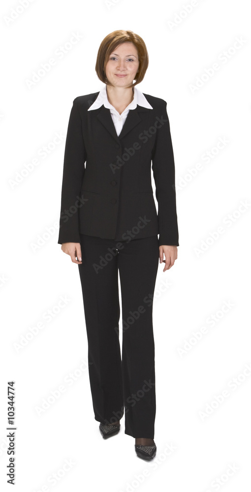 YOung businesswoman walking against a white background. YOung businesswoman walking against a white background.