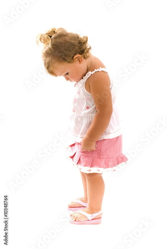 Cute Shy Toddler on white background .