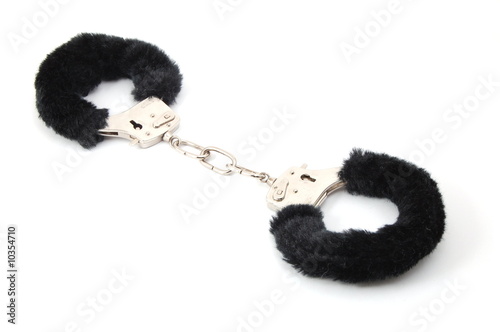 some handcuffs isolated on a white background photo