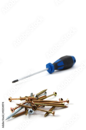 screwdriver and some screws isolated on white background