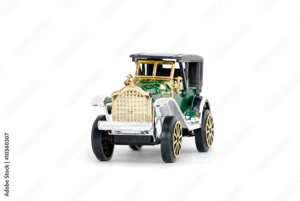 The toy vintage car cabriolet isolated on white