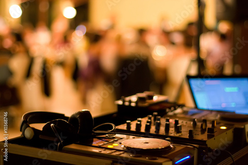 dj club dance party background with sound mixer console