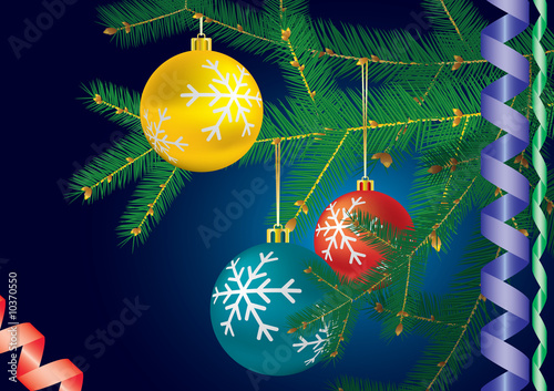 Decorated christmas-tree branch. Dark blue background.