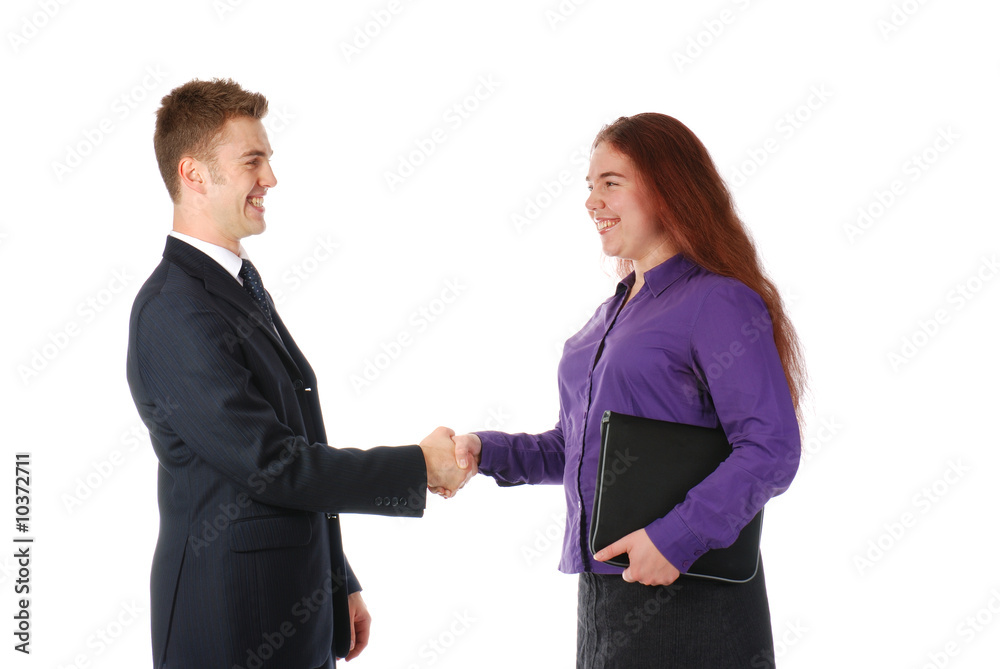 Two partners shaking hands and smiling