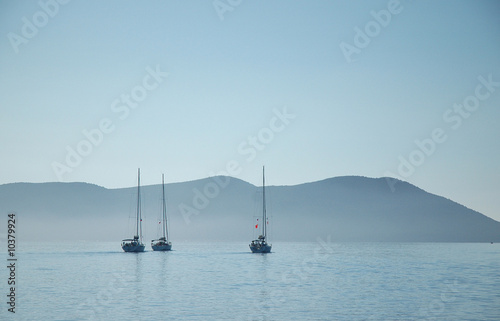 three yacht in the sea