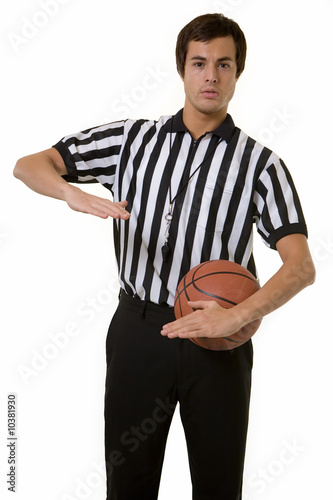 Man basketball referee calling a foul