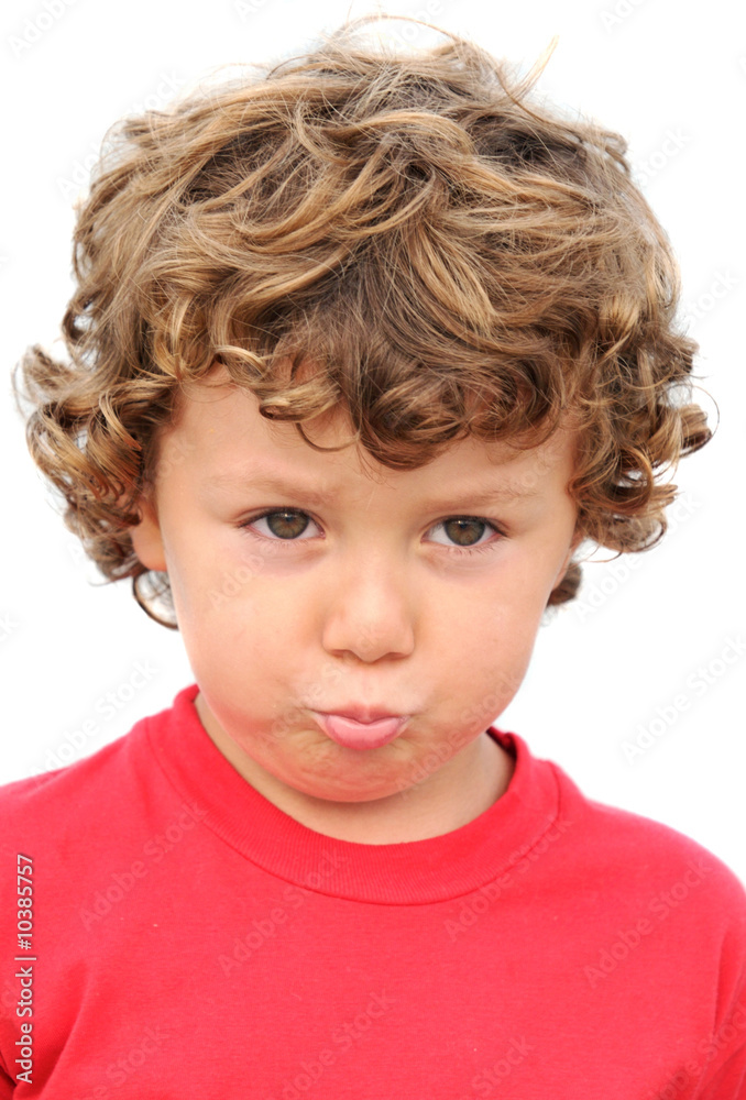 Adorable boy sad and gotten upset on a over white background Adorable boy sad and gotten upset on a over white background
