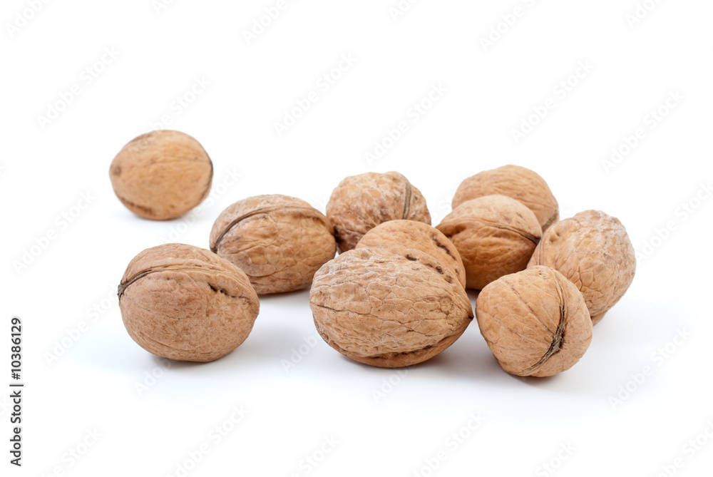 Few walnuts isolated on the white background Few walnuts isolated on the white background