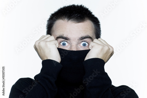 surprised man hiding photo