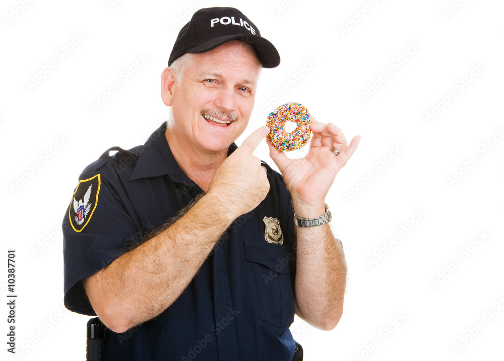 Policeman pointing to a delicious sprinkle covered donut.