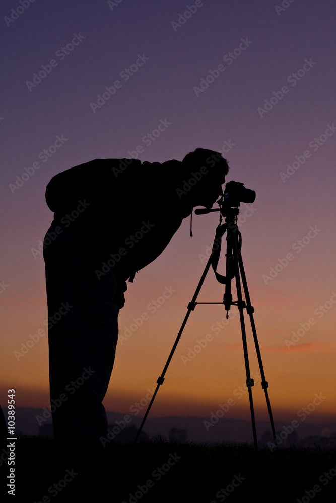 Photographfer at sunset