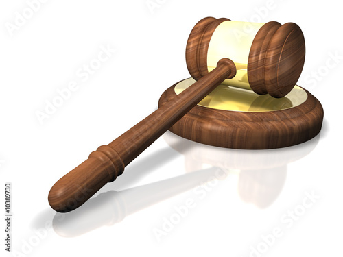 3D Render. Wooden and golden court gavel isolated