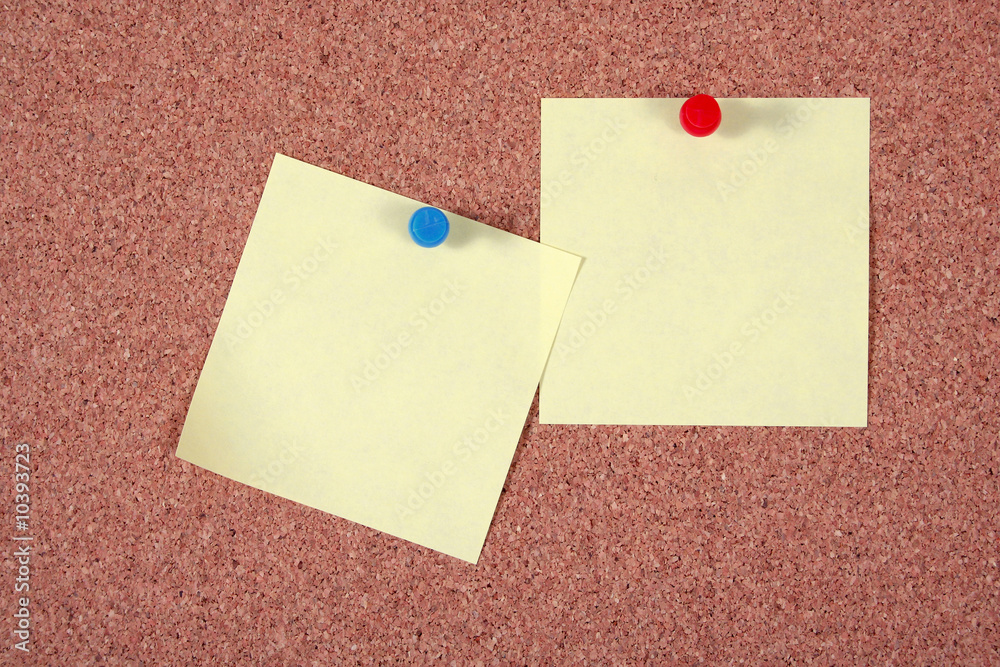 Paper on an isolated cork notice board. Paper on an isolated cork notice board.