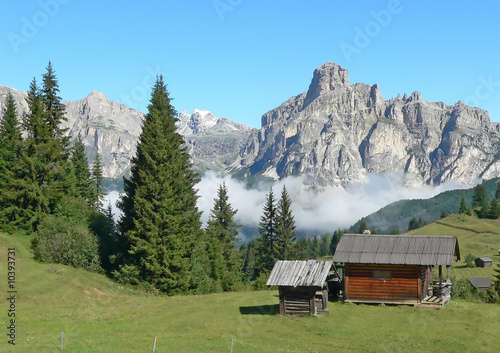 mountain landscape with wood house