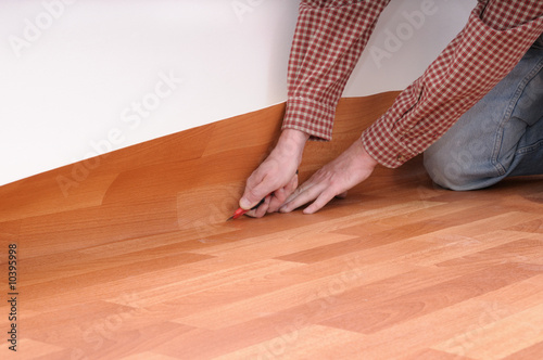 floormaker making a linoleum floor photo