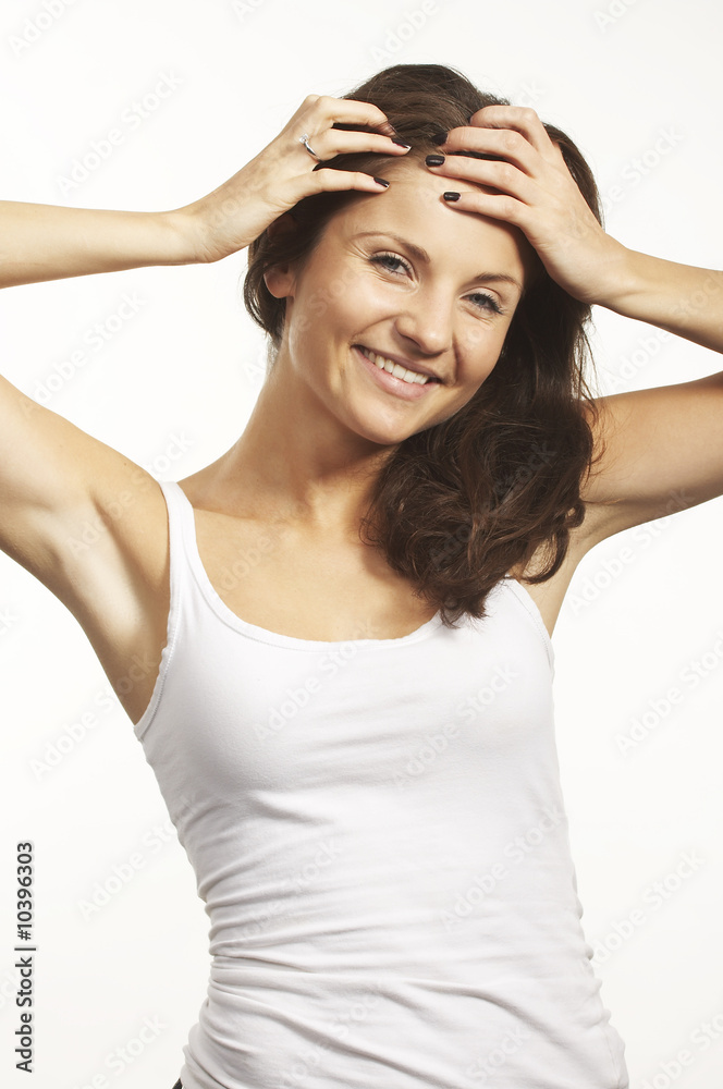 A happy young woman with facial expression on white background A happy young woman with facial expression on white background