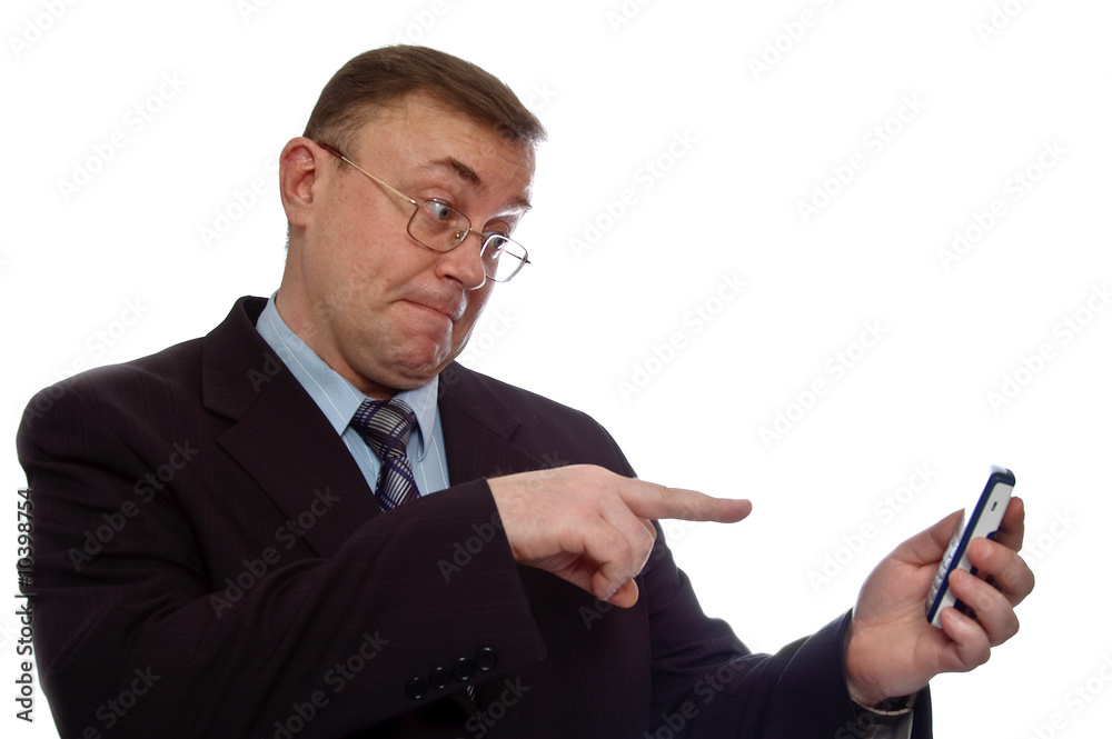 Angry businessman screaming on cell phone. Isolated Angry businessman screaming on cell phone. Isolated