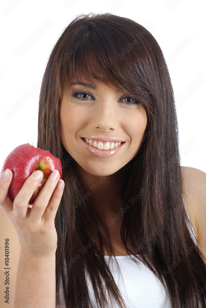 Beautiful young woman eating a red apple. Isolated over white Beautiful young woman eating a red apple. Isolated over white